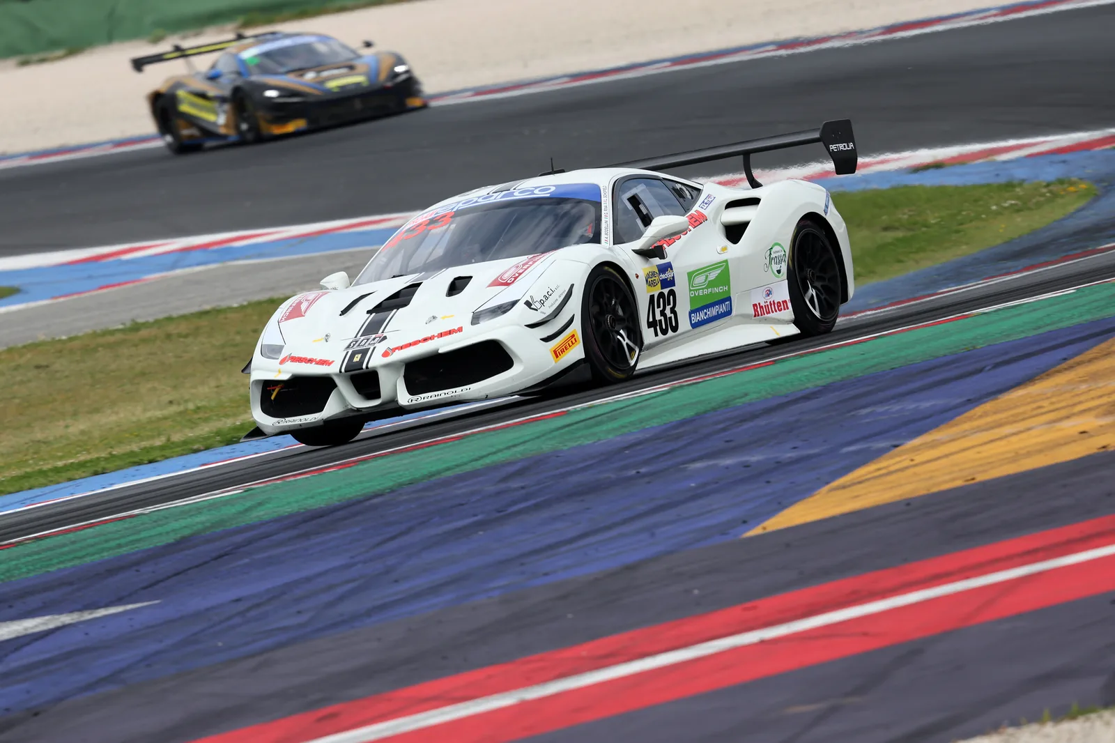 No. 433 riding the kerbs at Misano
